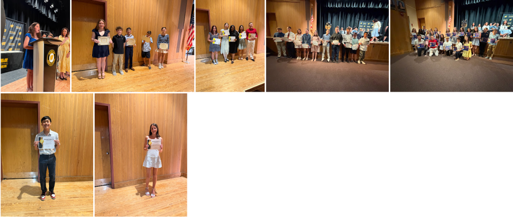 students receiving awards on stage